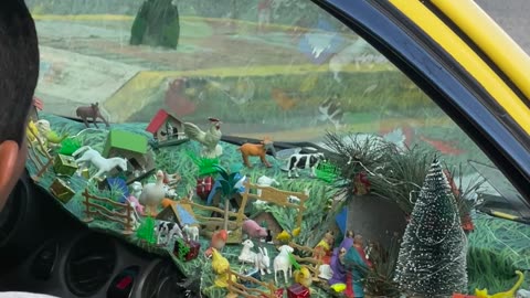 Taxi Driver Creates Complex Nativity Scene on Dashboard