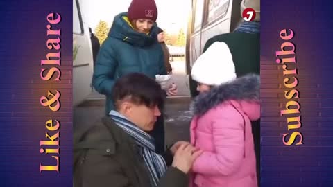 Ukrainian father of young children saying goodbye to them as he plans to stay and Fight