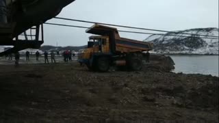 Moment Sunken Haulage Truck Pulled Out Of Lake Bed