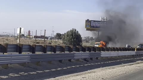 Car Parked in Emergency Lane Engulfed in Flames