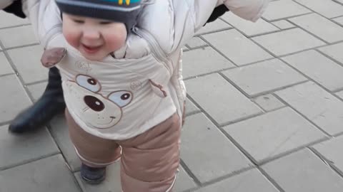 Baby from Russia takes his first steps