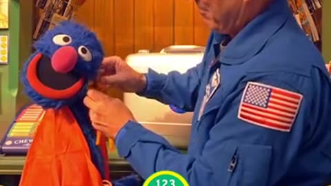 NASA Astronaut Returns Sesame Street Mementos Flown on Orion Spacecraft (Grover's cape)