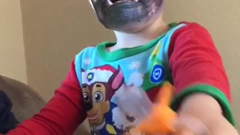 Adorable 2 year old tries to be scary.