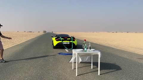 Tablecloth Pull Trick with a Supercar