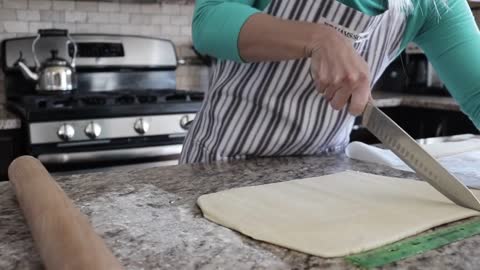 Preparing the dough to make a wonderful French croissant