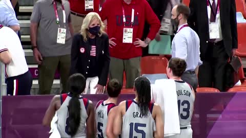 Macron, Jill Biden fist bump at Tokyo Olympics