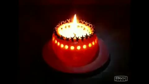 How to make a Decorated candle with orange