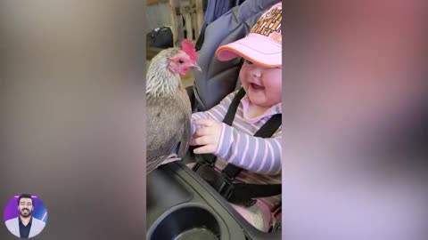 Try not to smile. Kid sees chicken for the first time and is very happy. Watch