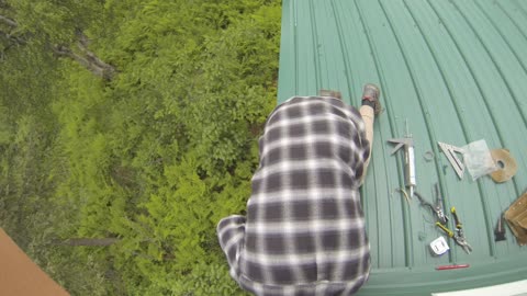 Planting raspberries in Alaska, working on the roof, splitting firewood