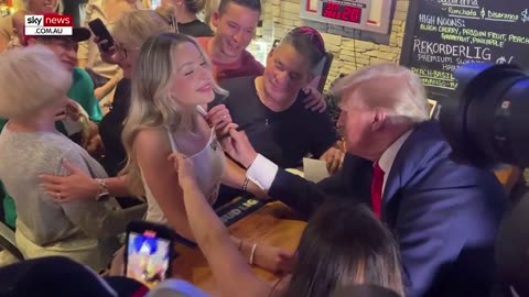 Donald trump's Pizza Party: Former President receives rockstar reception in lowa