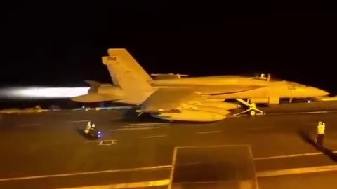 F-18 Taking Off Aircraft Carrier At Night