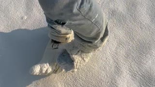 Roofer Breaking Foam Overspray off Work Shoes