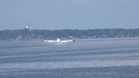 Fire Boss Plane scooping water Trinity Lake for walker County fire Huntsville Tx Sept 3 2023