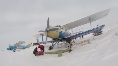 Daredevils skydive in freezing cold temperatures