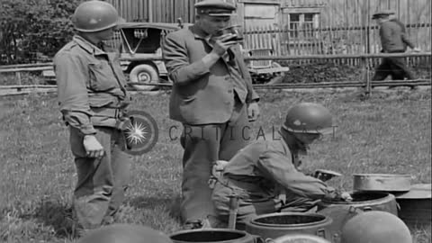 US soldiers and German prisoners eat food in Unter-Diessen, Germany during World ...HD Stock Footage