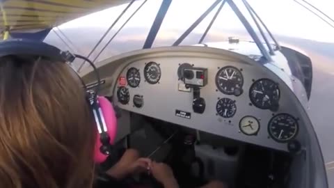 Girl Pilots Plane With Father