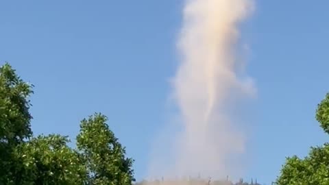 Dust Devil Dances in the Sky