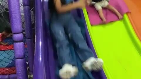 Mom Creates Mishap for Kids on Slide