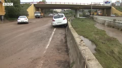 Severe flooding hits Spain's east coast after record rainfall - BBC News