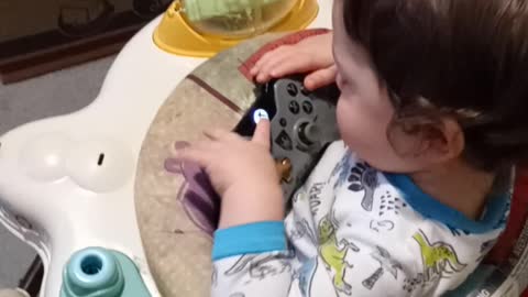 My son learing how to use an xbox one controller