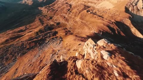 Outdoor aerial photography, capturing the beautiful sunset over the Grand Canyon in the evening