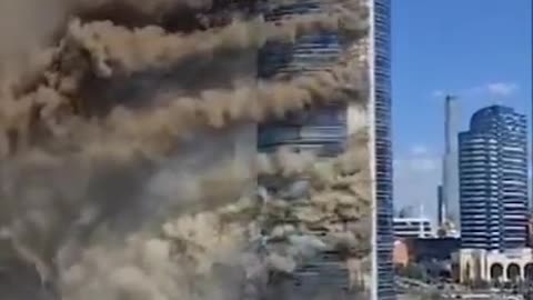 Massive fire large plumes of smoke rise from apartment building on fire in Astana, Kazakhstan