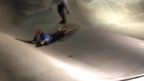 Teen brown shirt blue skatefail