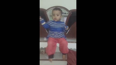 The baby girl fell down while playing, you too will laugh