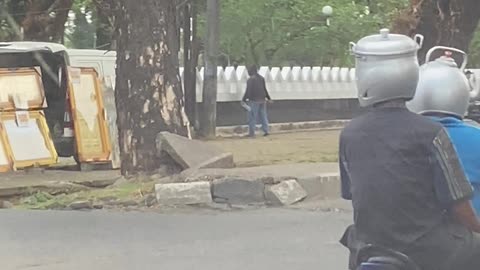 Makassar Motorists Have Helmet Pots