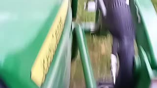 John Deere mowing