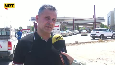 He stands in the gasoline queue and says, “We will queue for two hours in the heat