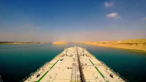 SUEZ CANAL - 120 MILES LONG - THE WATER IS FLAT