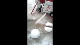 Arctic Steamer cuts through block of ice