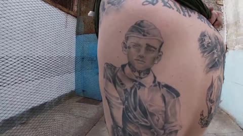 Ukrainain POWs "condemn" their Nazi tattoos - "because it's in the past now.