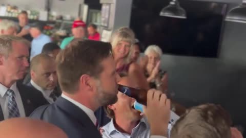 JD Vance has a beer with a supporter at Gordons Butcher in Erie, PA