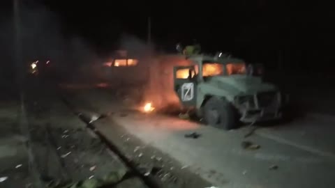 Russia attacks Ukraine - city Kharkiv, russian "Tiger" at night