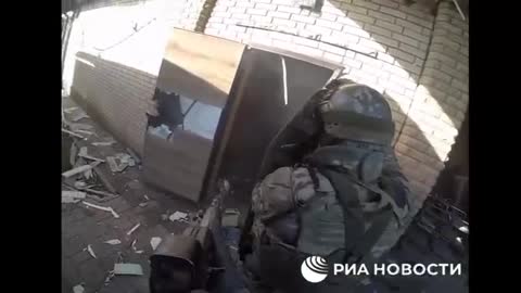 Russian Forces Find a Cache of Ukrainian weapons \ Uniforms in a civilian basement