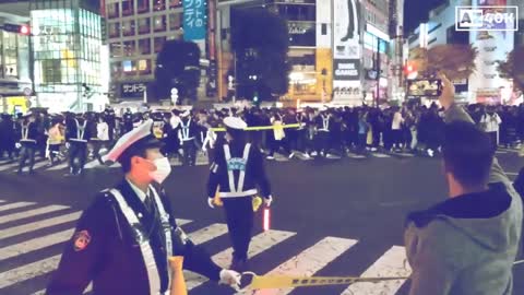 Japan Fans Celebrate 2-1 Win Over Germany at Shibuya Crossing in Tokyo