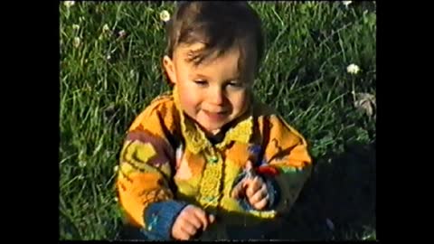 Baby boy's first time in a flower field