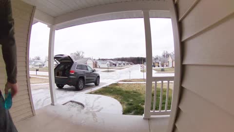 Man Loading Car Slips on Ice in Hard Fall