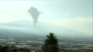 After calm, La Palma volcano shoots up cloud of smoke