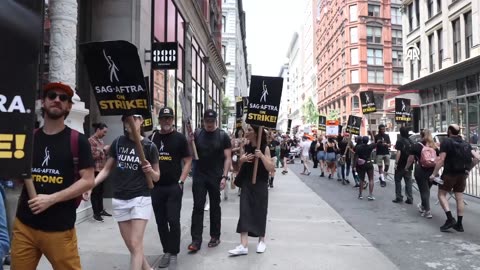 Thousands of performers show support for striking screenwriters in New York