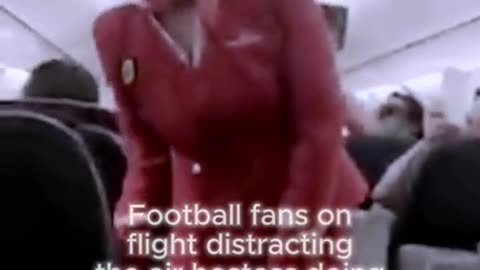 Football fans on flight#