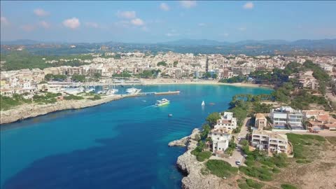 aerial view landscape of the beautiful bay of cala anguila with a wonderful turquoise sea porto