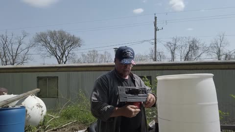 Utilizing a 55 gallon Plastic barrel in a container Garden to plant potatoes in.