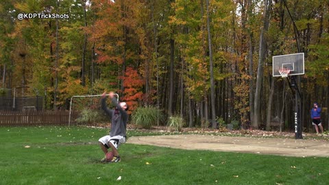 Impressive backflip basketball trick shot