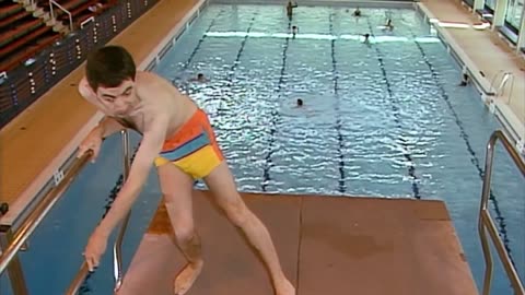 Mr Bean goes swimming and tries to attempt the diving board!