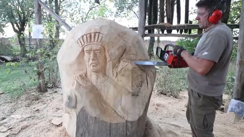 AMAZING CHAINSAW wood carving, Native American with wolves