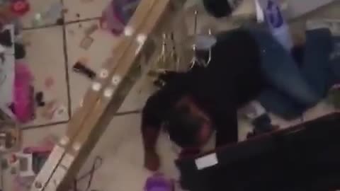 guy drops the chandelier then falls off the ladder.