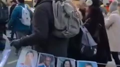 A trail of photographs of just a tiny fraction of those lost to the jab, carried by the crowd en route through central London to Downing Street.